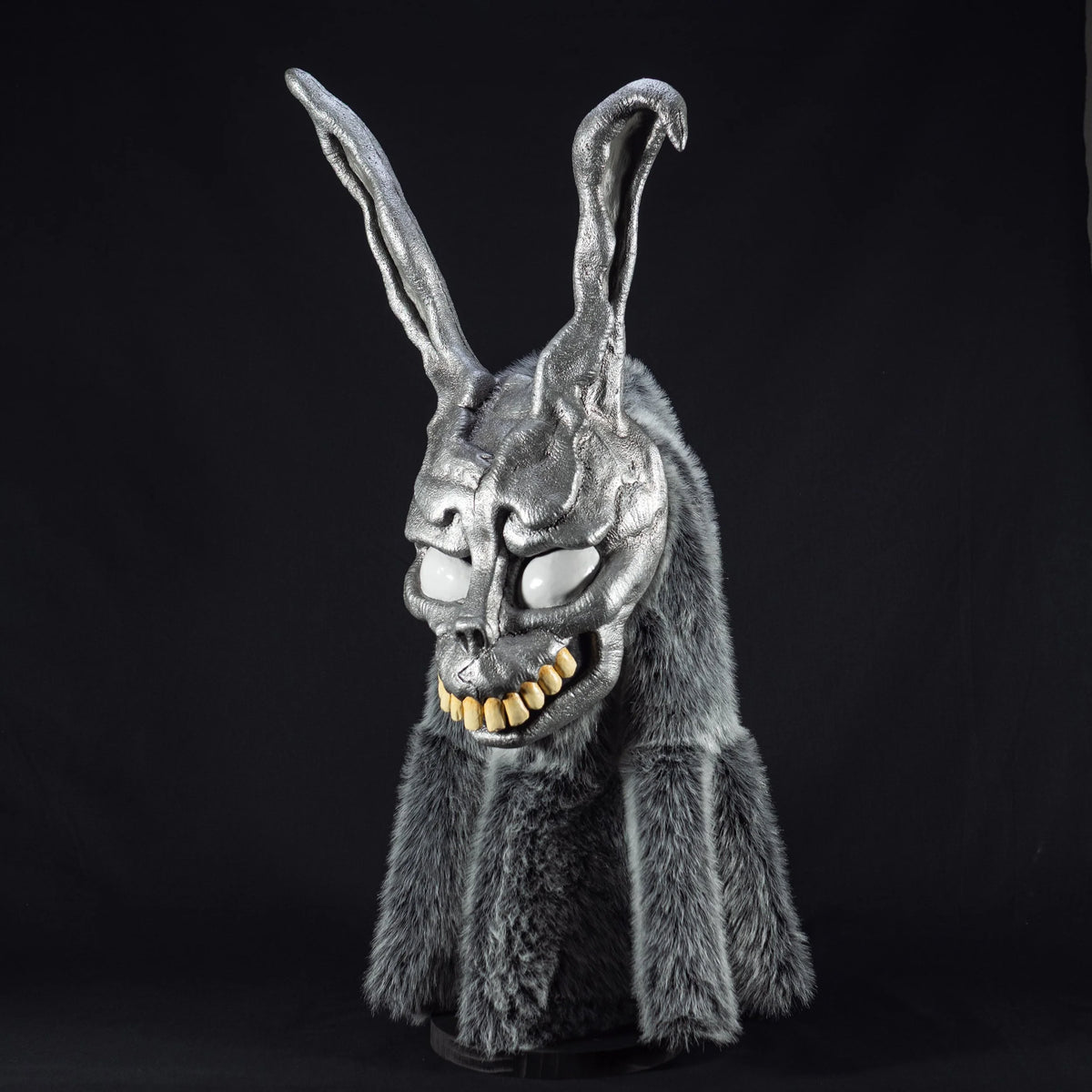 Frank the Rabbit mask replica with fur hood, angled view